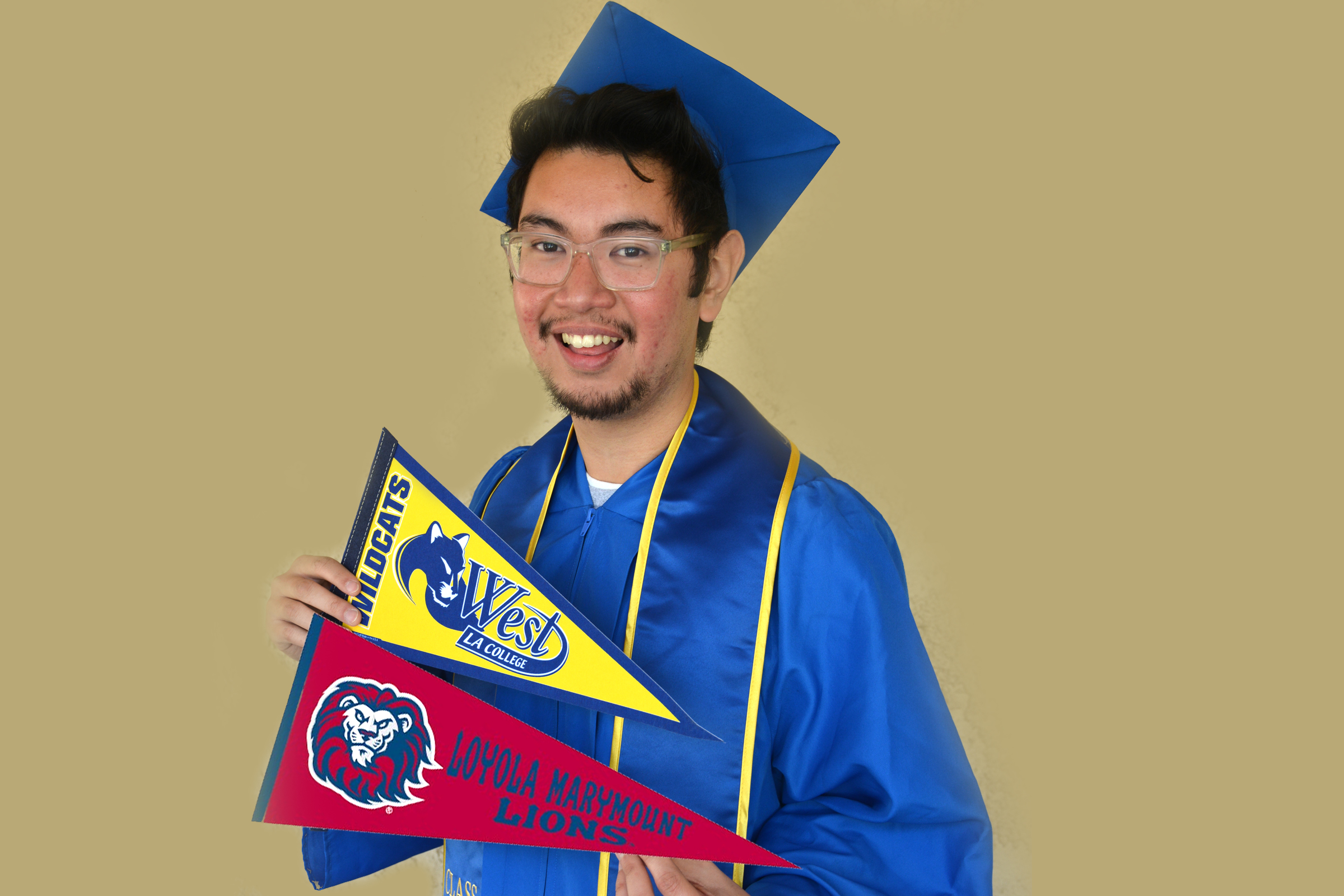student holding WLAC and LMU pennants