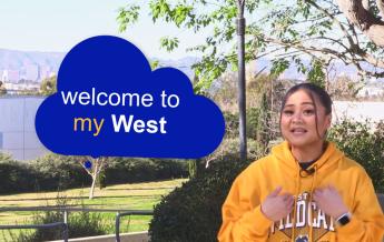 Student with "Welcome to my West" text