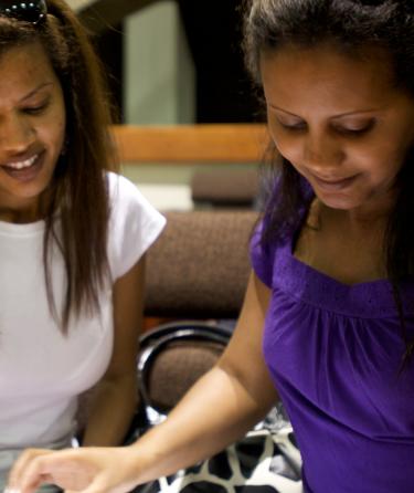 Two Girls Studing