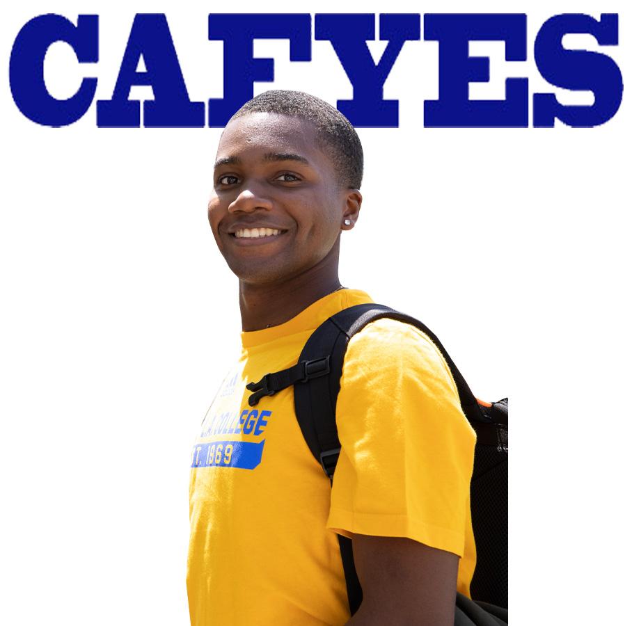 student in front of CAFYES sign