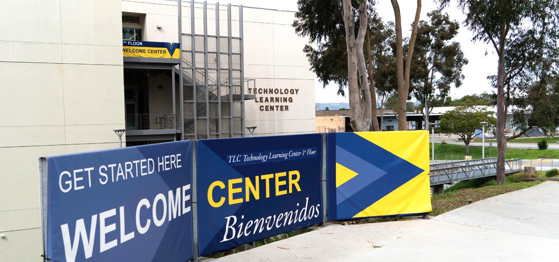 Sign pointing to Welcome Center